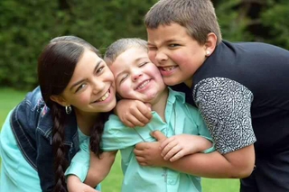 Ayanna, their 4-year-old brother and Quincy (courtesy of Cassandra Merlin)